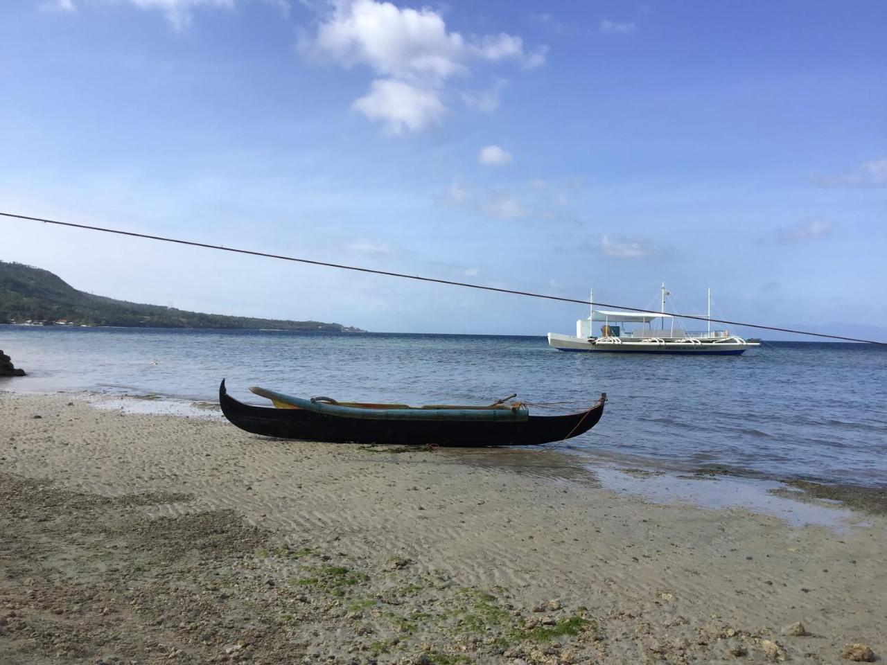 Cuestas Beach Resort And Restaurant Badian Eksteriør bilde